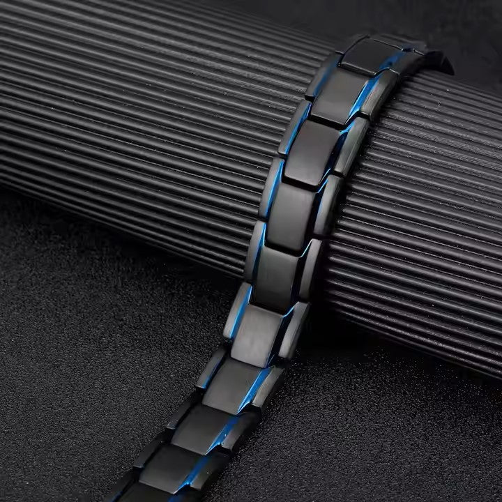 Pulsera IB magnética unisex ajustable azul y negro.