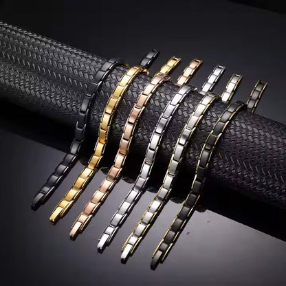 Pulsera IB magnética unisex ajustable dorada.
